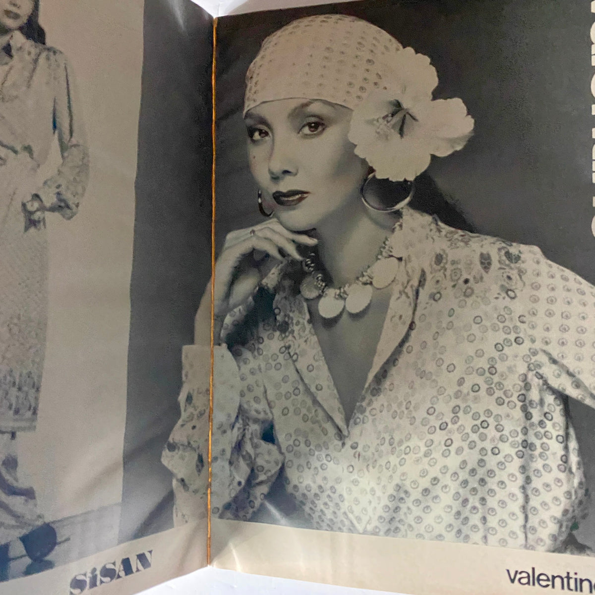Black and white fashion editorial from Harper's Bazaar Magazine March 1977 featuring a model in elegant attire, illustrating timeless fashion styles.