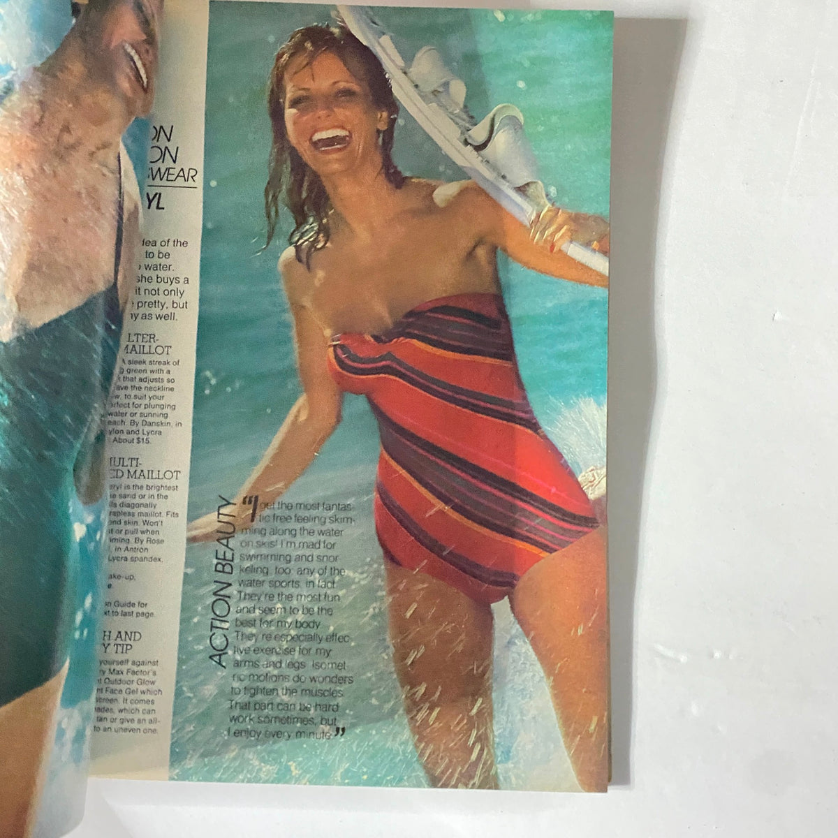 Harper's Bazaar Magazine May 1977 featuring a swimwear model in a striped one-piece suit enjoying a day at the beach, representing 1970s fashion trends.