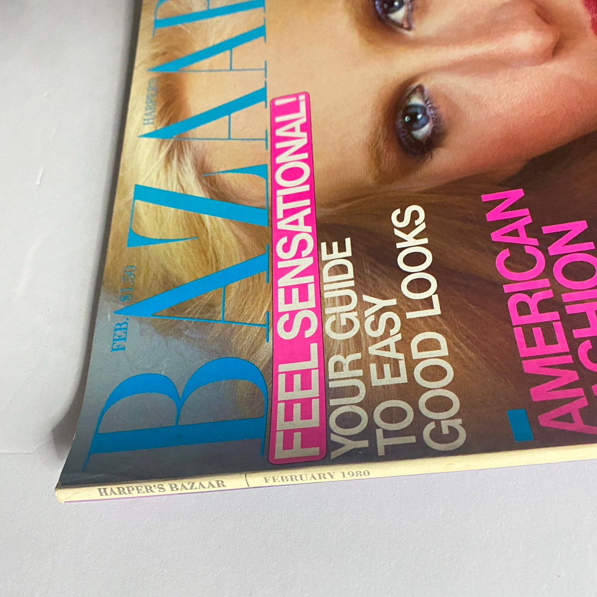 Side view of Harper's Bazaar Magazine February 1980 displaying the magazine title and publication date, emphasizing its vintage appeal and condition for collectors.