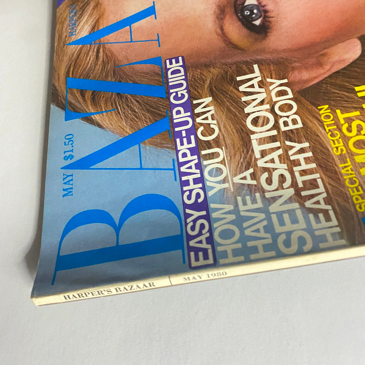 Close-up view of Harper's Bazaar Magazine May 1980, showcasing the vibrant cover design and text including key features on health and fashion.