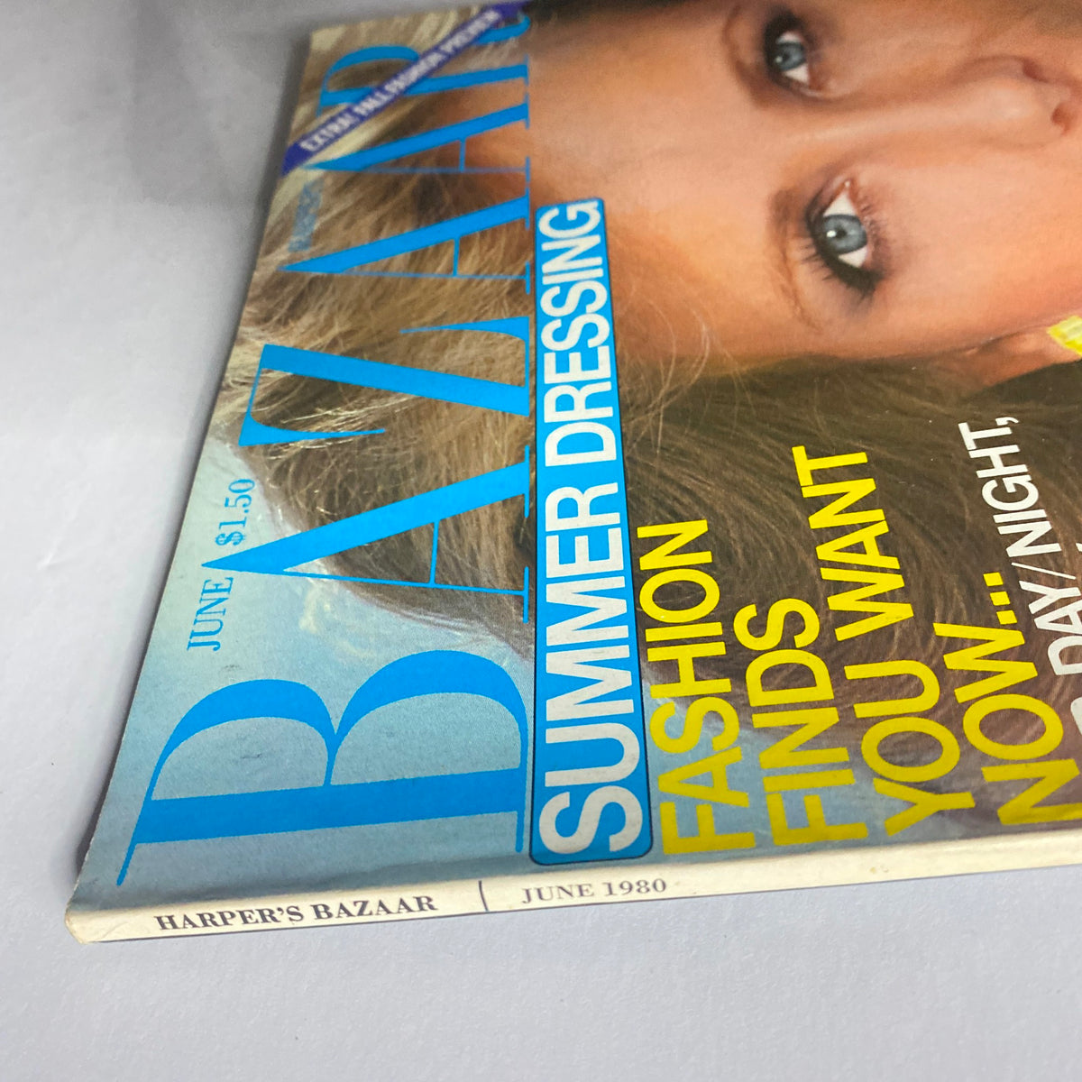 Close-up view of Harper's Bazaar Magazine June 1980 showcasing the magazine title and subtitle 'Summer Dressing'. The image emphasizes the vintage appeal of this fashion magazine.