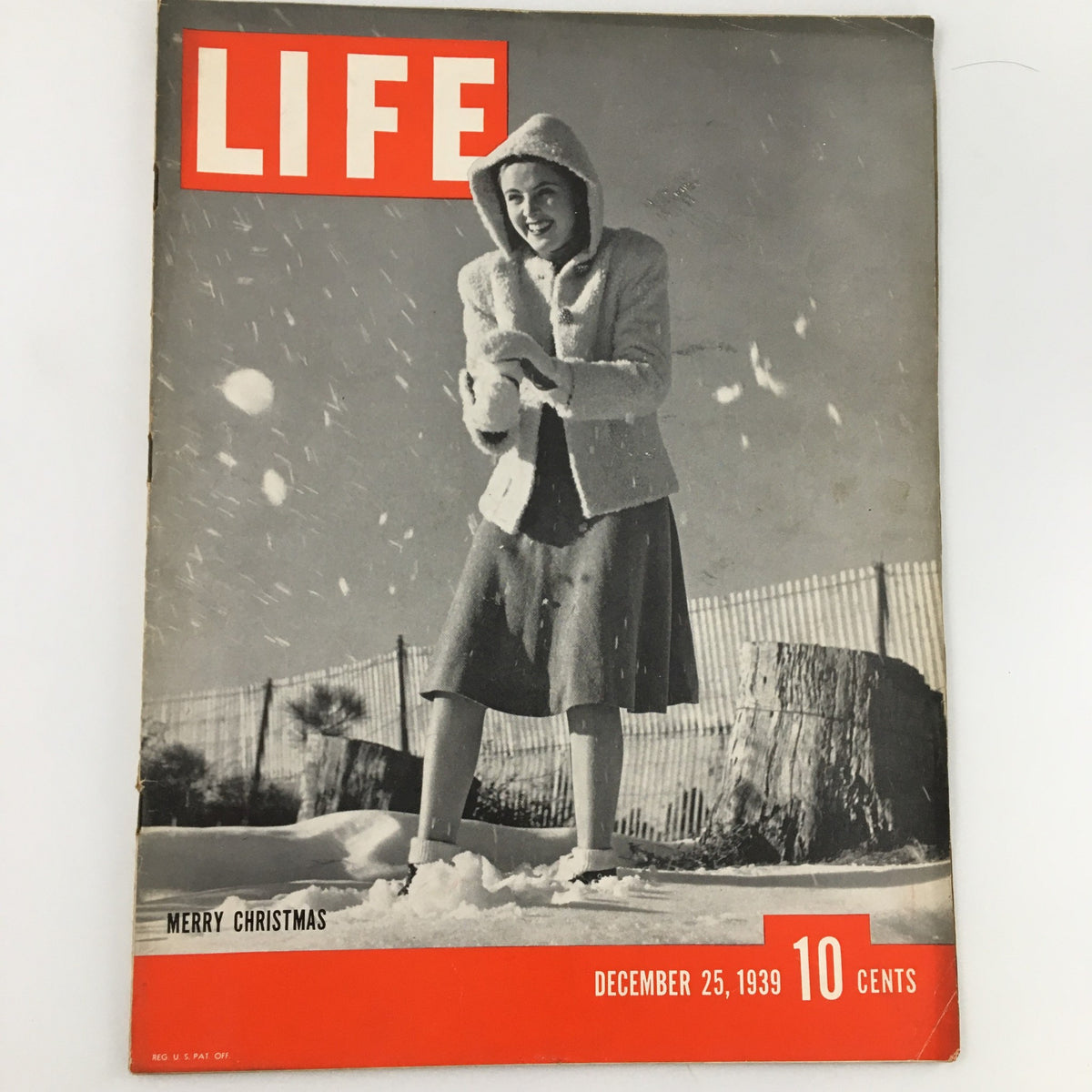 Cover of Life Magazine dated December 25, 1939, featuring a Merry Christmas theme, showcasing a young woman in winter attire playing in the snow. The title 'LIFE' is prominently displayed in bright red at the top, with the date and price listed below.