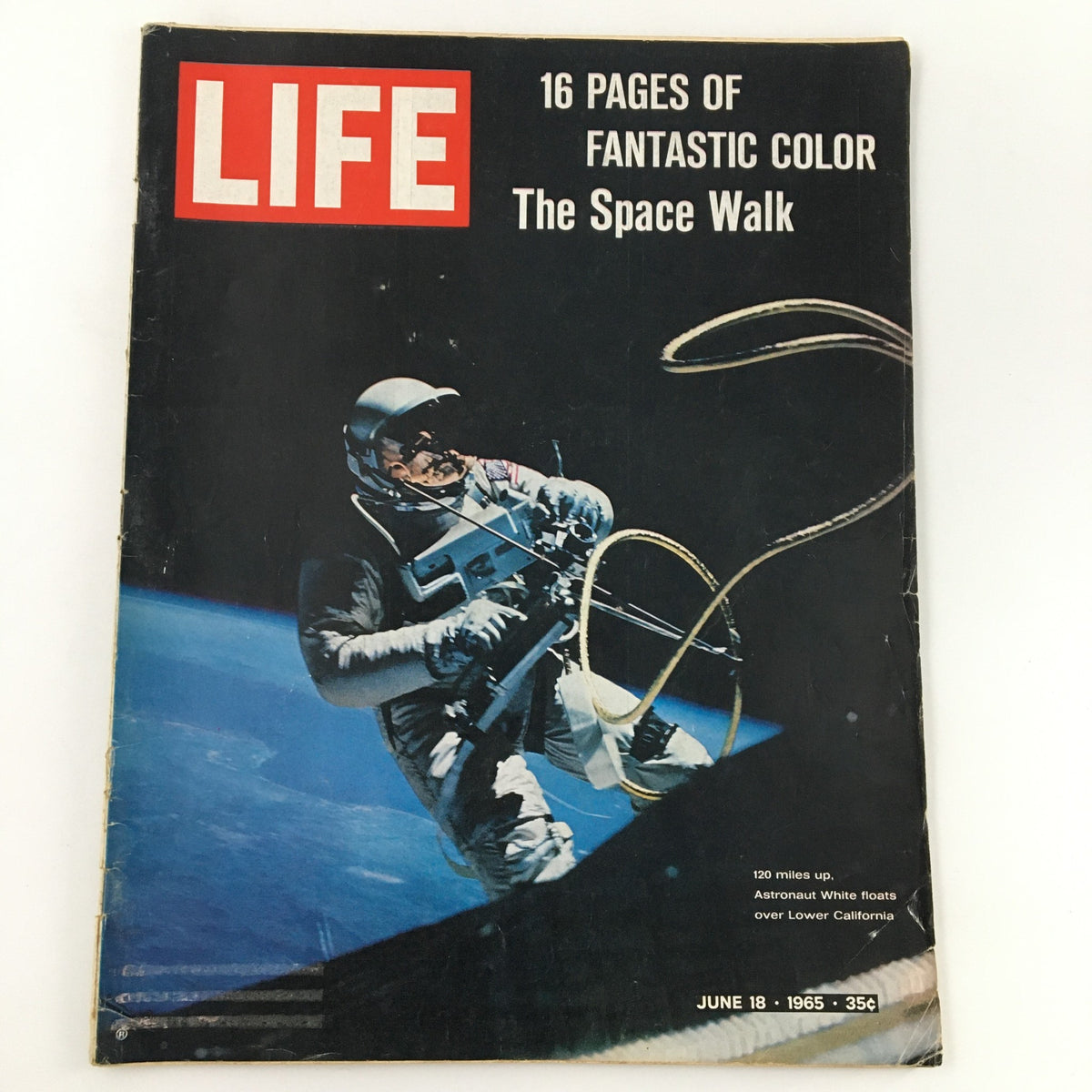 Cover of VTG Life Magazine June 18, 1965 featuring Astronaut Edward White during his spacewalk, showcasing vibrant colors and iconic design.