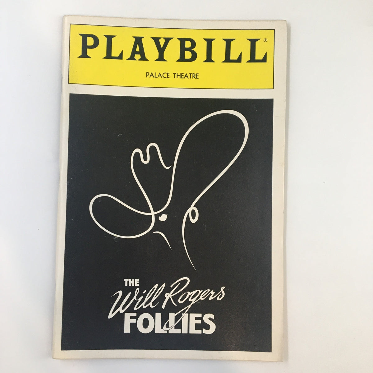 1991 Playbill for The Palace Theatre featuring The Will Rogers Follies, showcasing a minimalist cover design with a whimsical illustration.