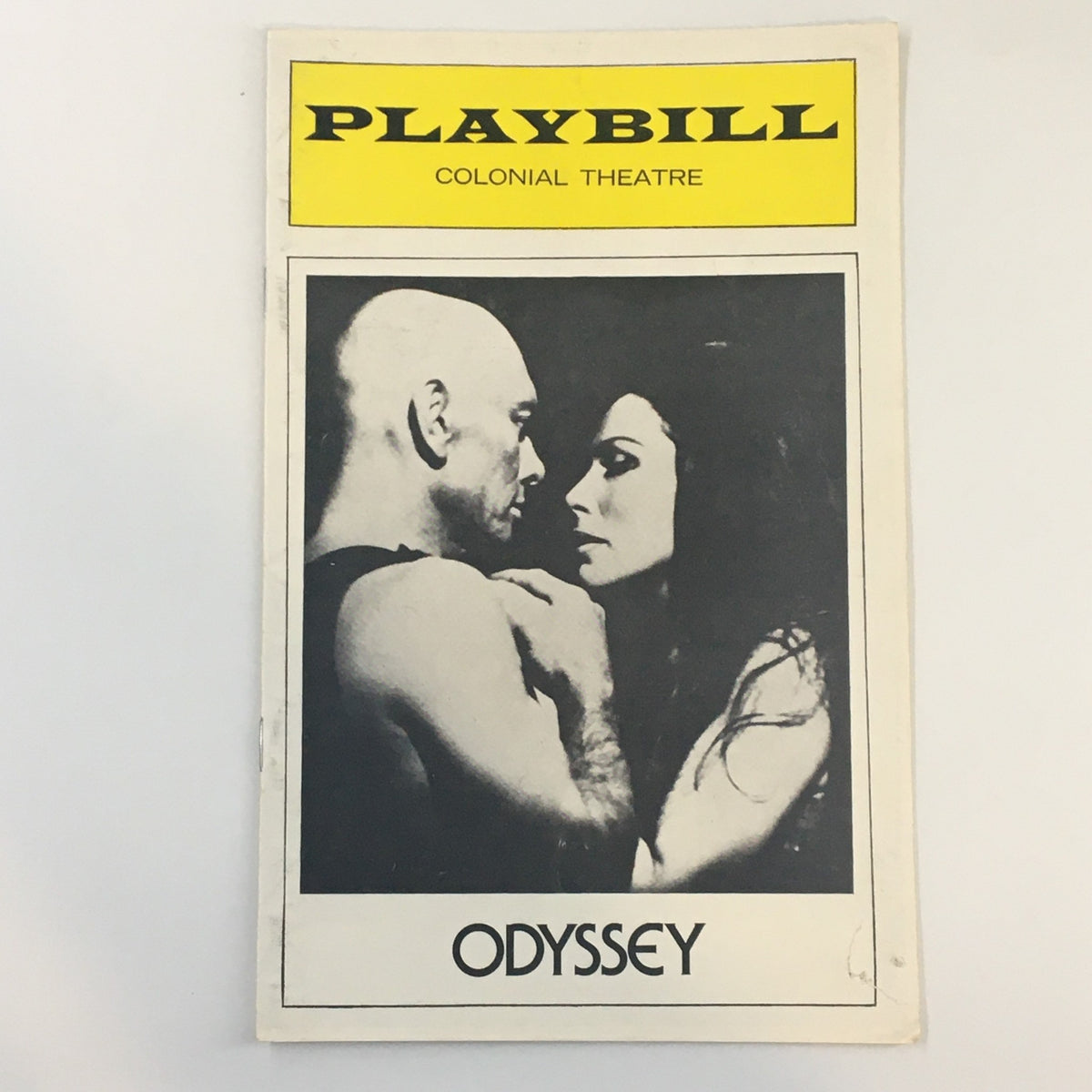 1975 Playbill featuring Yul Brynner in the production 'Odyssey' at The Colonial Theatre, showcasing a dramatic black and white image of the lead characters.