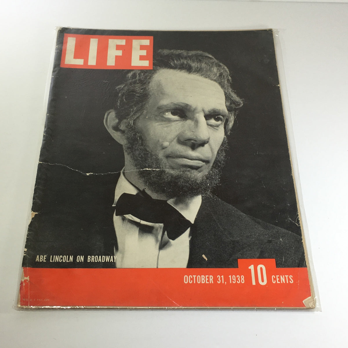 Vintage Life Magazine cover from October 31, 1938 featuring Abe Lincoln On Broadway with a prominent red and black design.