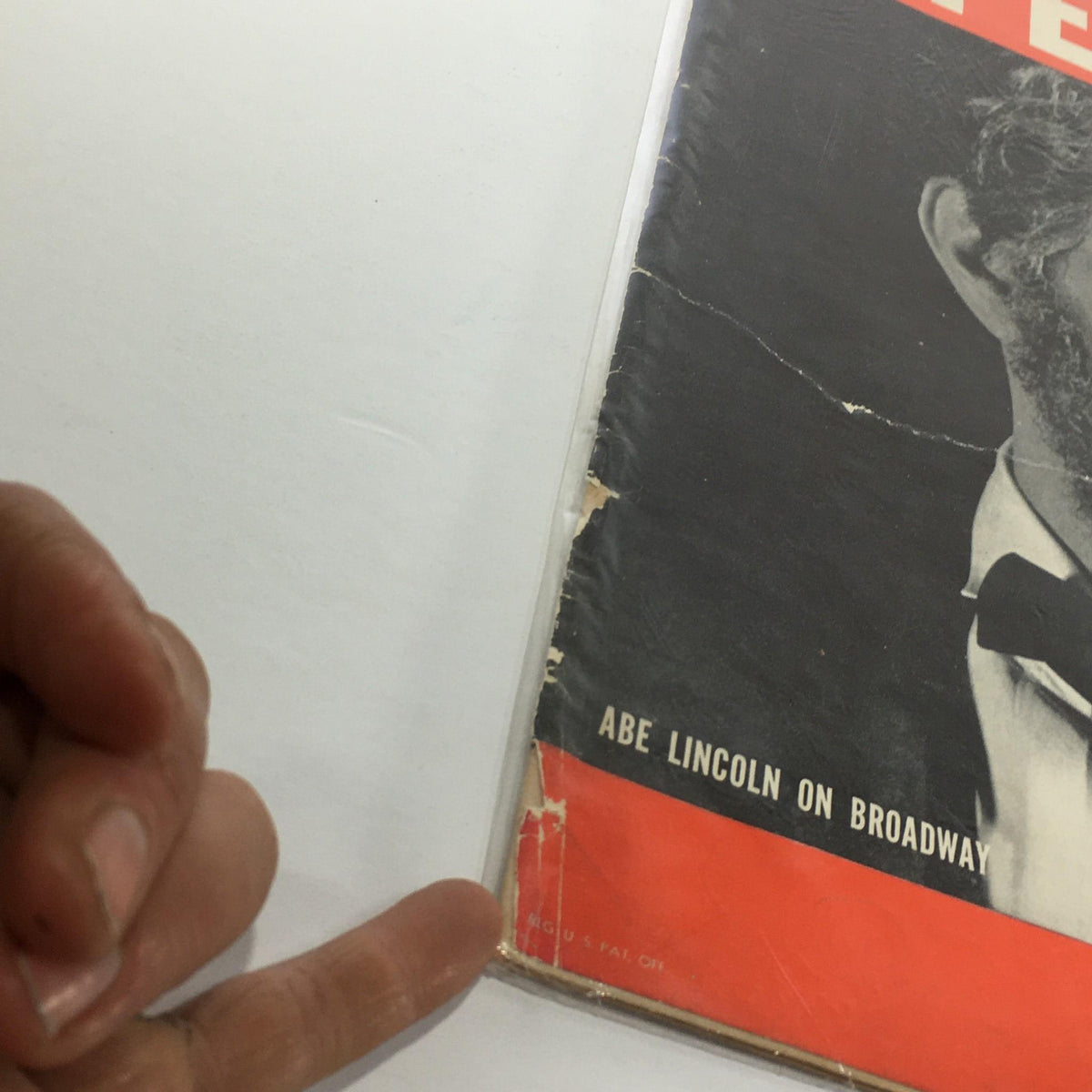 Close-up of the Vintage Life Magazine cover from October 31, 1938 highlighting the title Abe Lincoln On Broadway and visible wear.