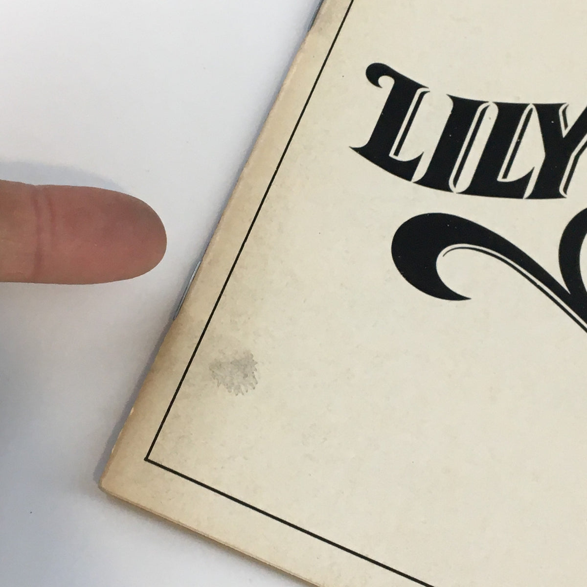 Close-up detail of the 1986 Playbill for 'Lily Dale' by Horton Foote, highlighting minor wear and the iconic title.