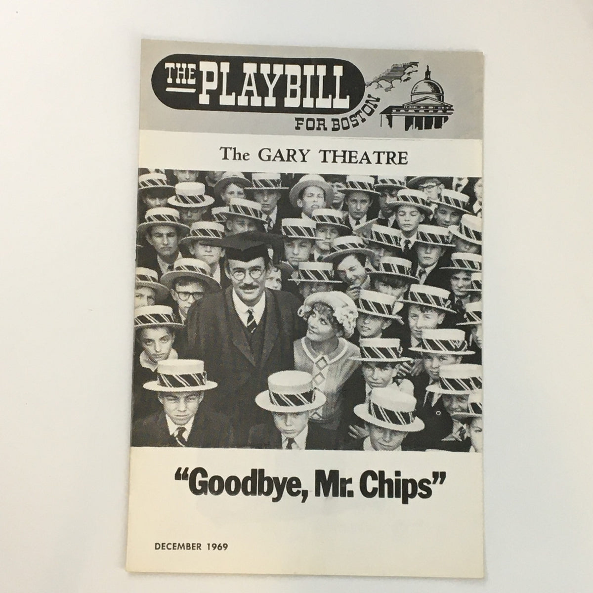 1969 Playbill for The Gary Theatre featuring the production of "Goodbye Mr. Chips." The cover showcases a vintage design with a crowd of elegantly dressed individuals wearing hats.