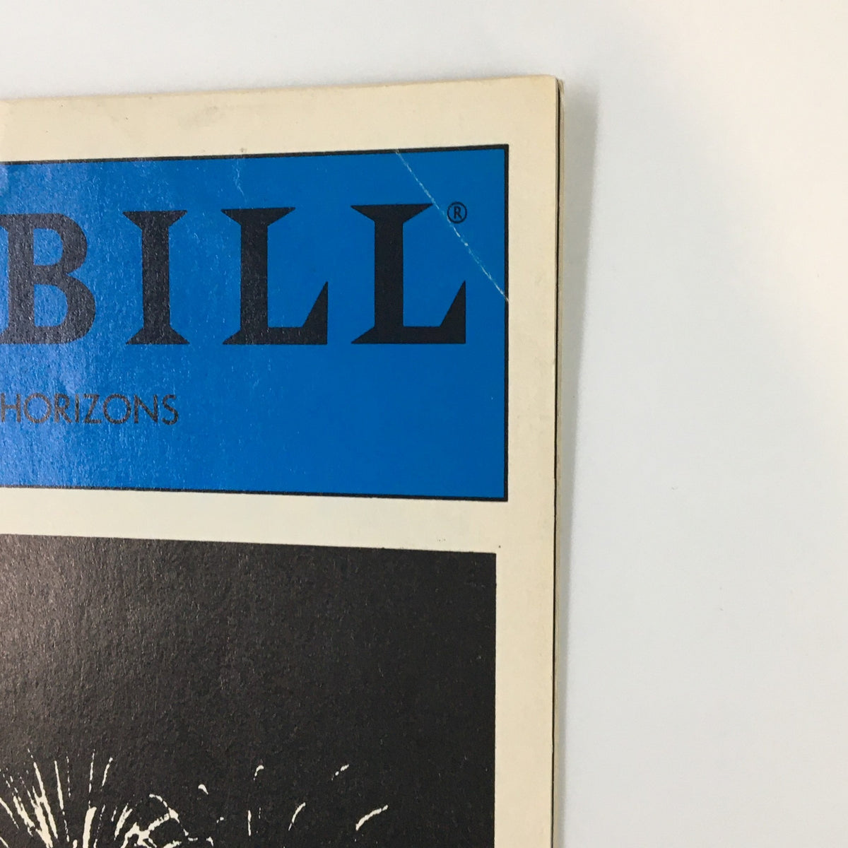 Close-up view of the 1986 Playbill for The Perfect Party by A.R. Gurney Jr., highlighting the blue title and fireworks design on the cover.