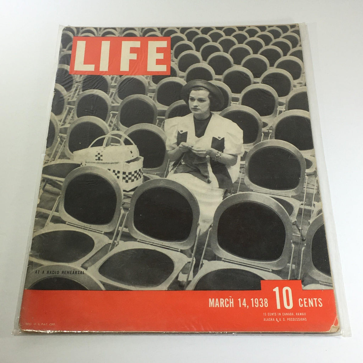 Cover of Vintage Life Magazine: March 14 1938 featuring a woman at a radio rehearsal, surrounded by empty chairs.