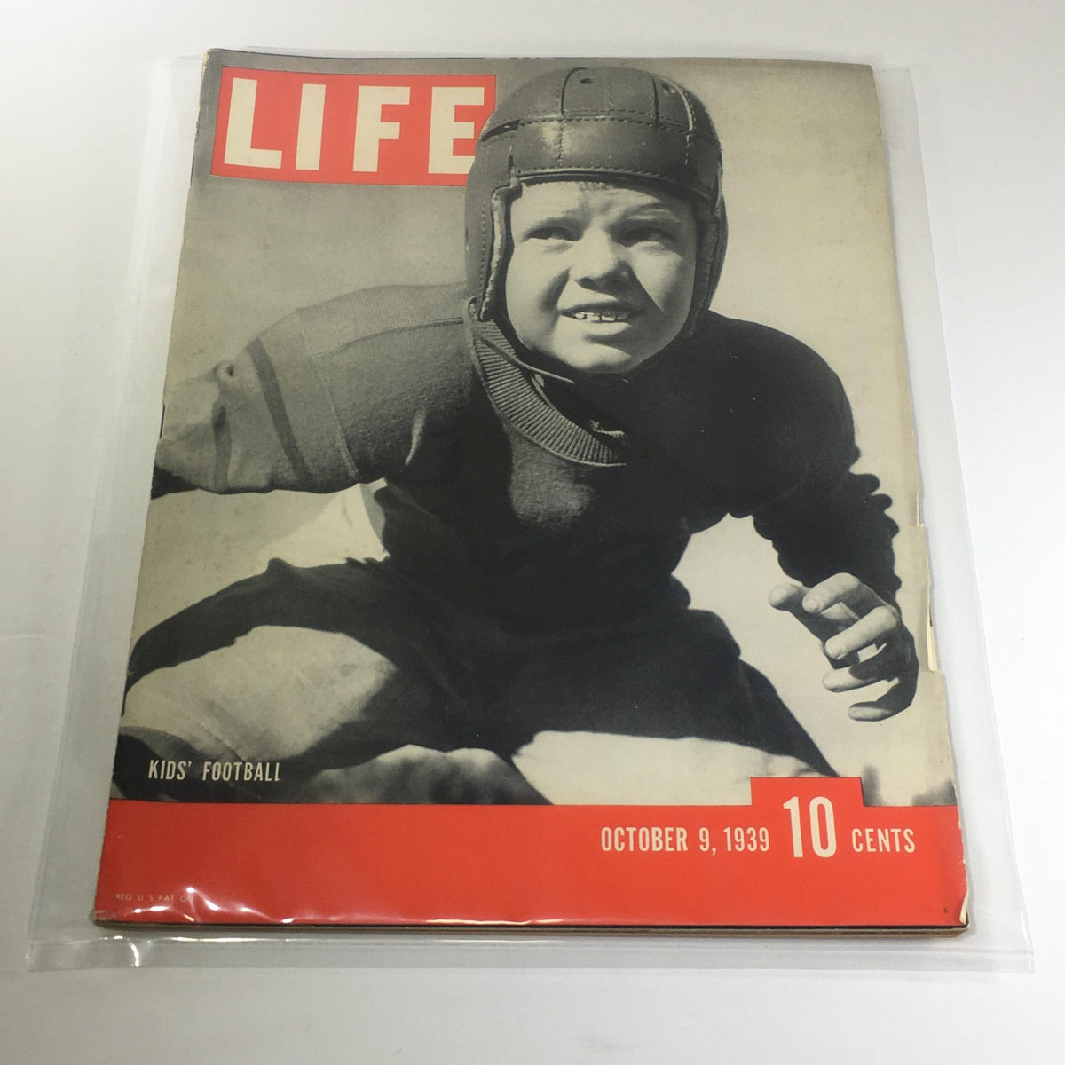 Vintage Life Magazine: October 9, 1939 - Kids' Football cover featuring a young boy in a football uniform, showcasing the nostalgic charm of youth sports from the late 1930s.