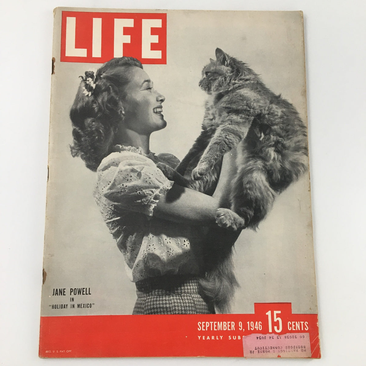 Cover of Life Magazine from September 9, 1946 featuring actress Jane Powell holding a cat, promoting her role in 'Holiday in Mexico'.
