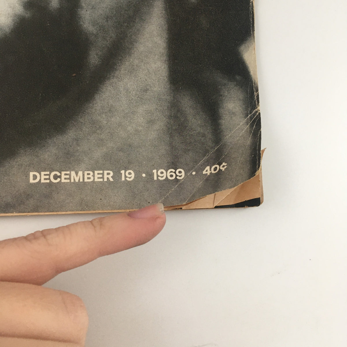 Close-up view of the lower corner of the VTG Life Magazine December 19 1969, indicating the date and price of 40 cents, with minor wear visible on the edges of the magazine.