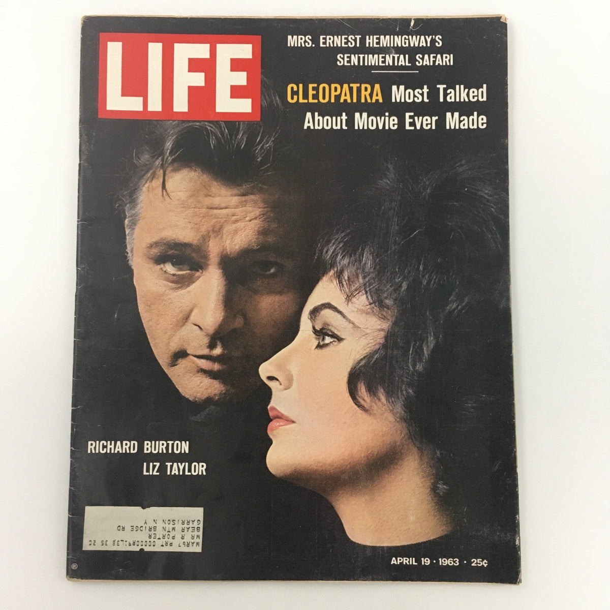 Cover of the VTG Life Magazine from April 19, 1963, featuring Richard Burton and Elizabeth Taylor. The cover showcases a close-up of their faces, highlighting the article about the movie 'Cleopatra,' described as the most talked-about movie ever made.