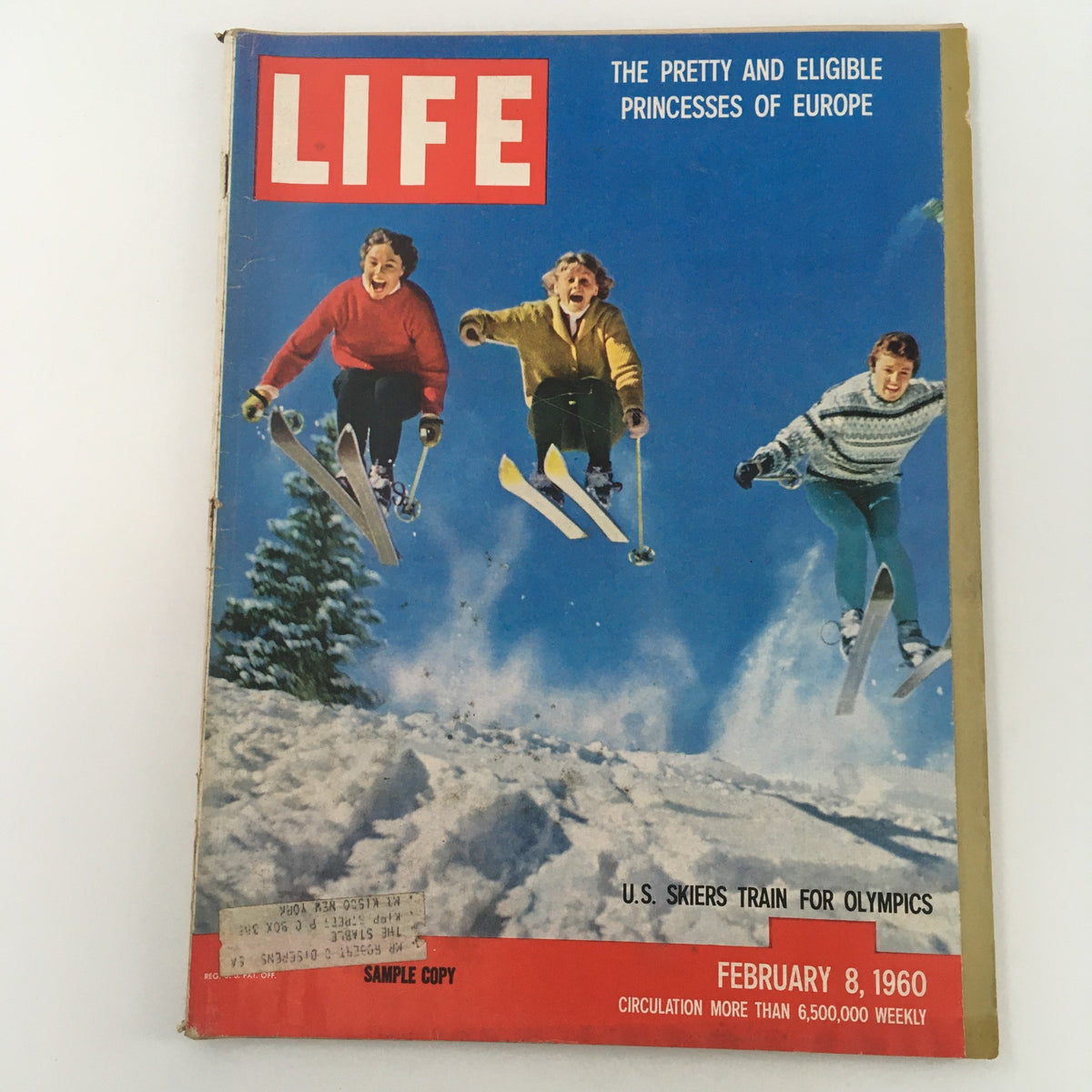 VTG Life Magazine February 8 1960 cover featuring three U.S. skiers in vibrant ski attire training for the Olympics in a snowy landscape.
