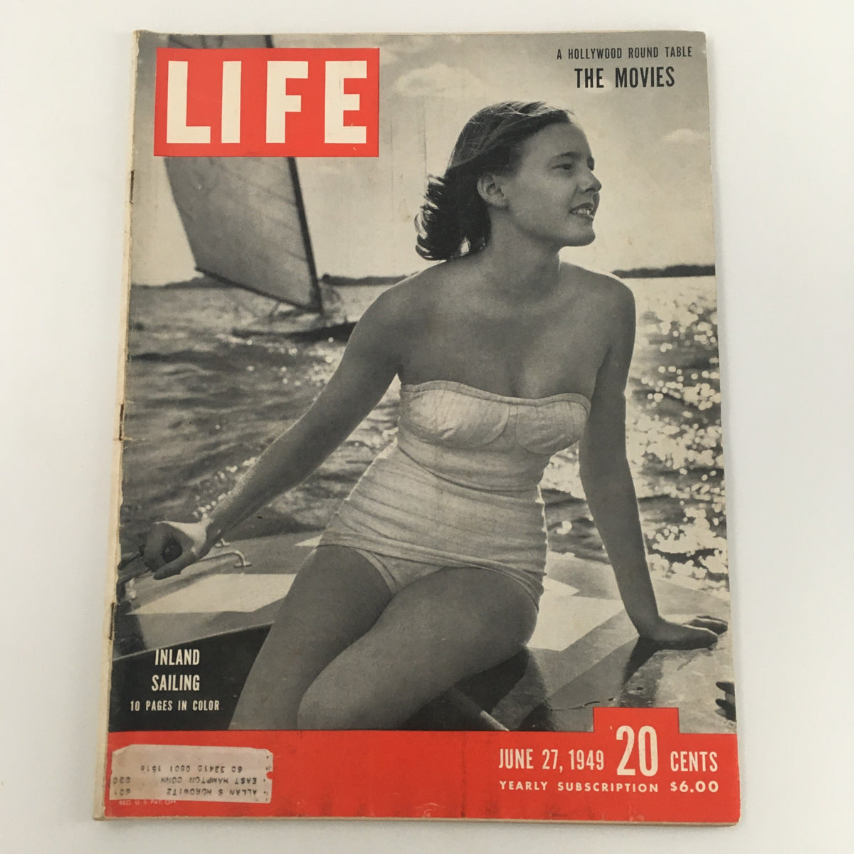 Cover of VTG Life Magazine June 27, 1949 featuring a woman sailing with the title Inland Sailing and The Movies Hollywood, highlighting post-war leisure and cinema.