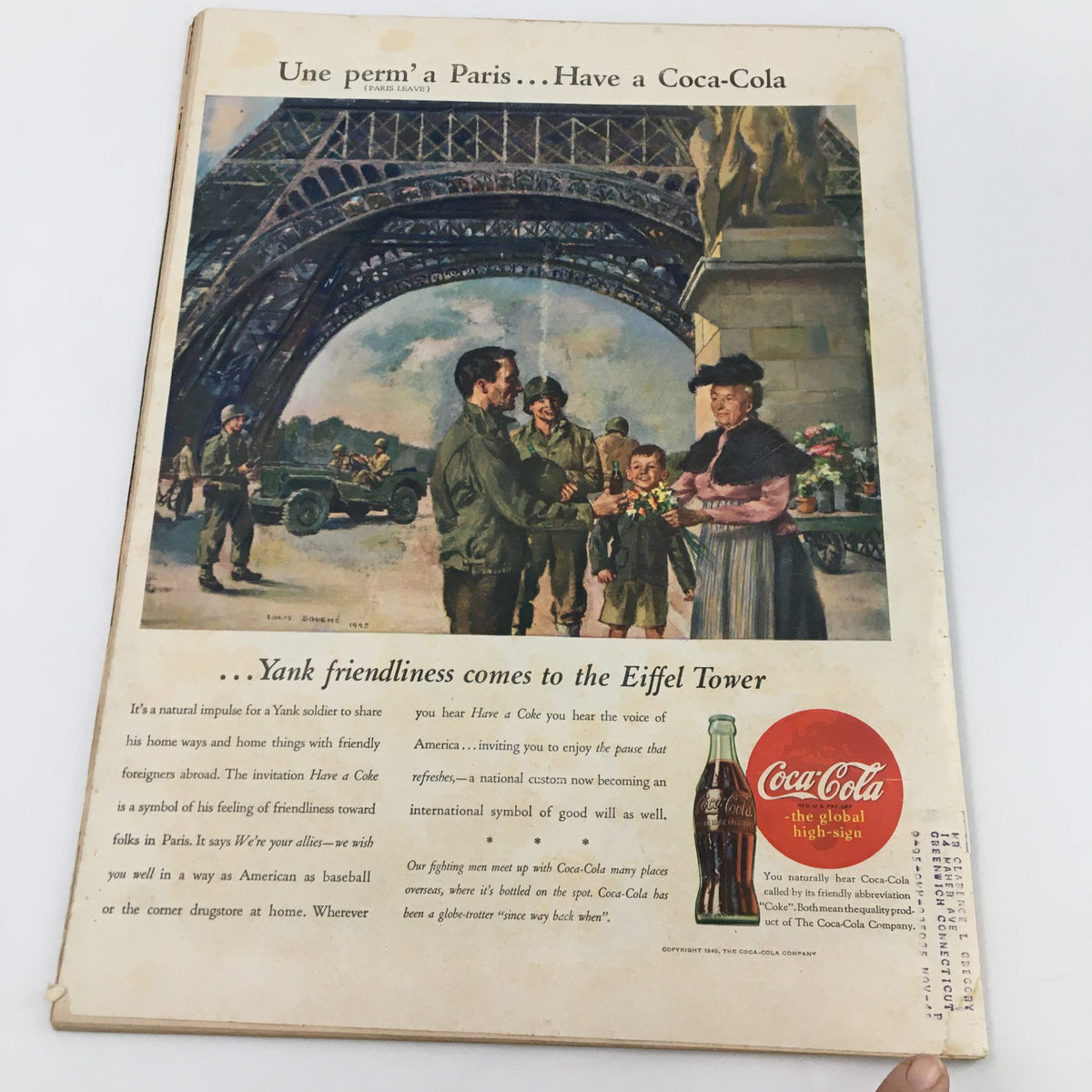 Back cover of VTG Life Magazine from July 2, 1945 showcasing a Coca-Cola advertisement with soldiers and locals under the Eiffel Tower in Paris.