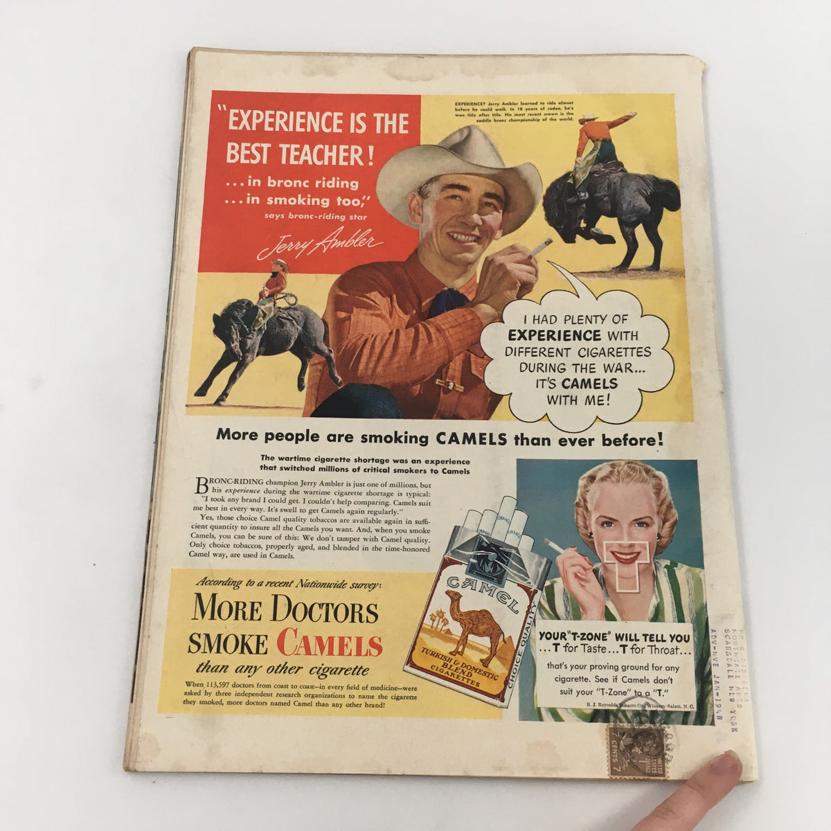 Back cover of Life Magazine September 1, 1947 illustrating a colorful advertisement for Camel cigarettes with a cowboy and actress.