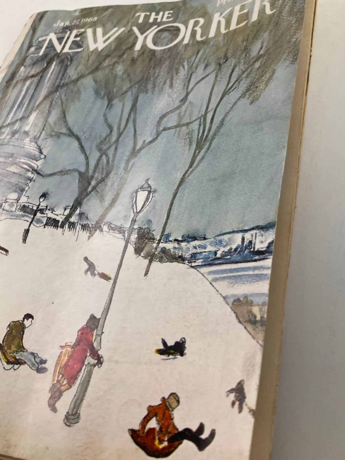 Close-up view of The New Yorker magazine cover from January 27, 1968, showcasing the artwork 'Snow Park' by James Stevenson, with details of snow-covered park and figures in winter attire.