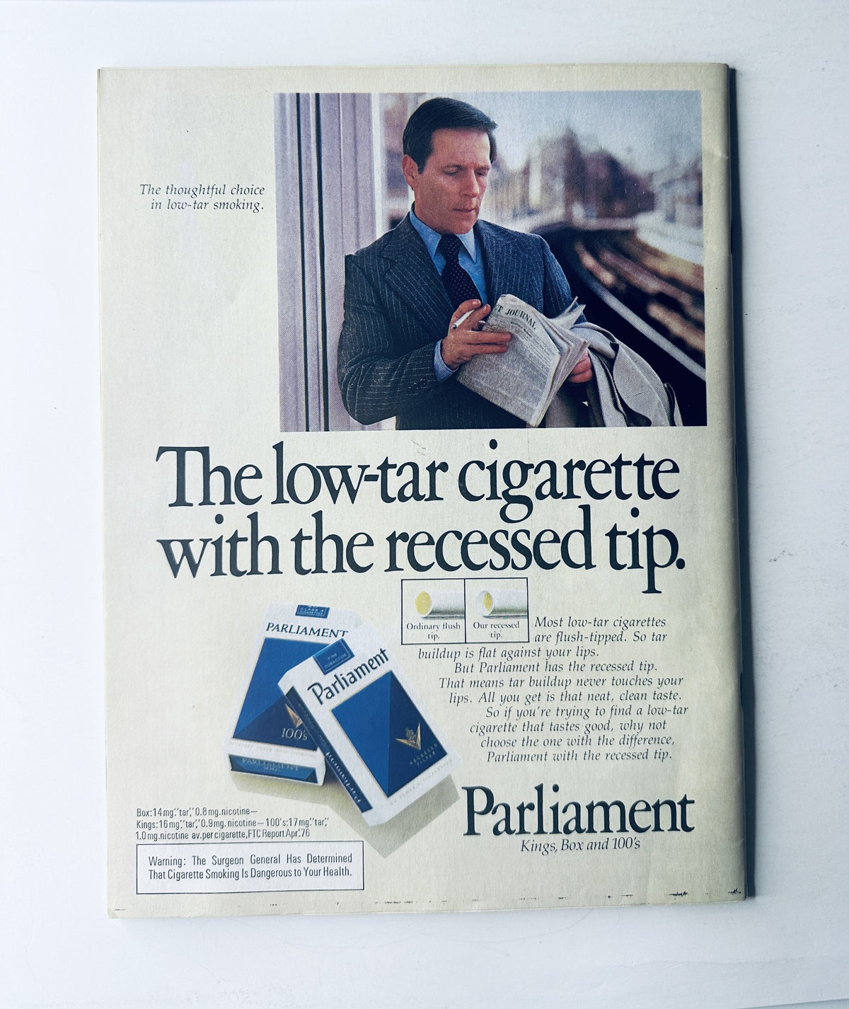 Back cover of Time Magazine October 25, 1976, featuring an advertisement for Parliament cigarettes with a businessman reading.