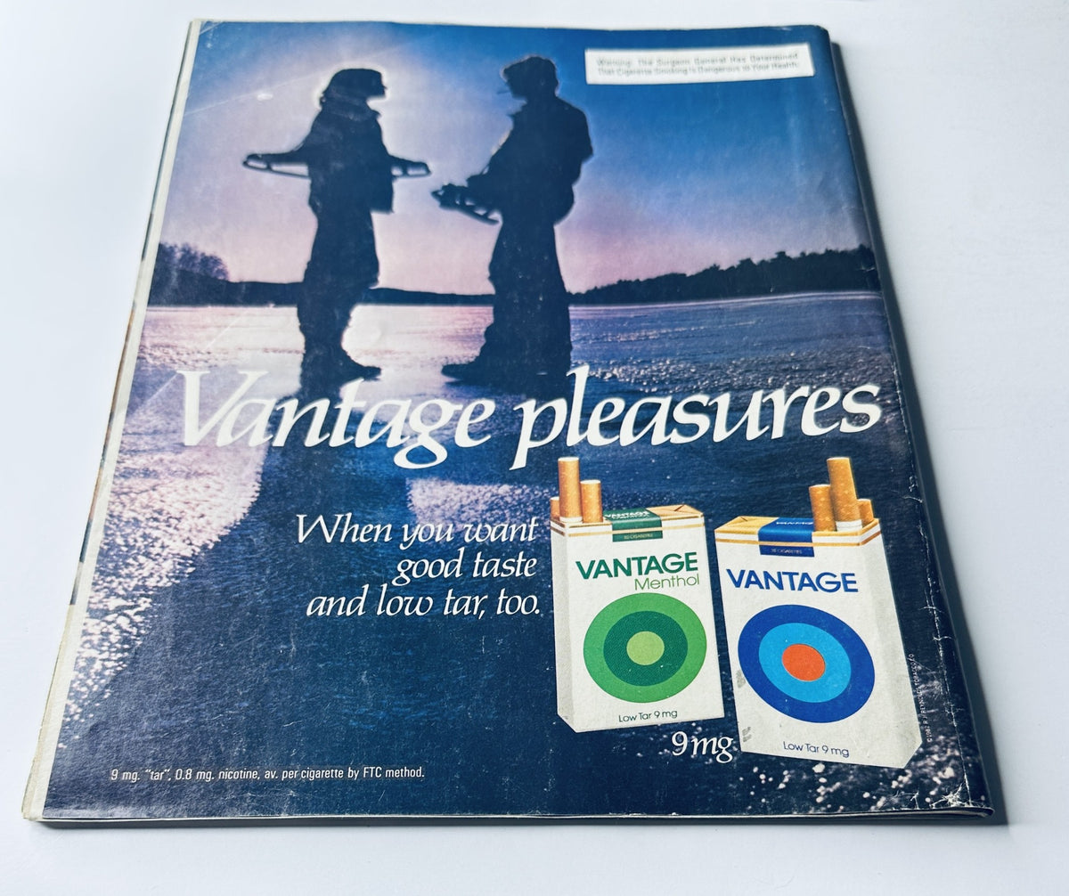 Close-up of the Vantage cigarette advertisement on the back of Sports Illustrated Magazine January 11, 1982, featuring two figures and product packaging.