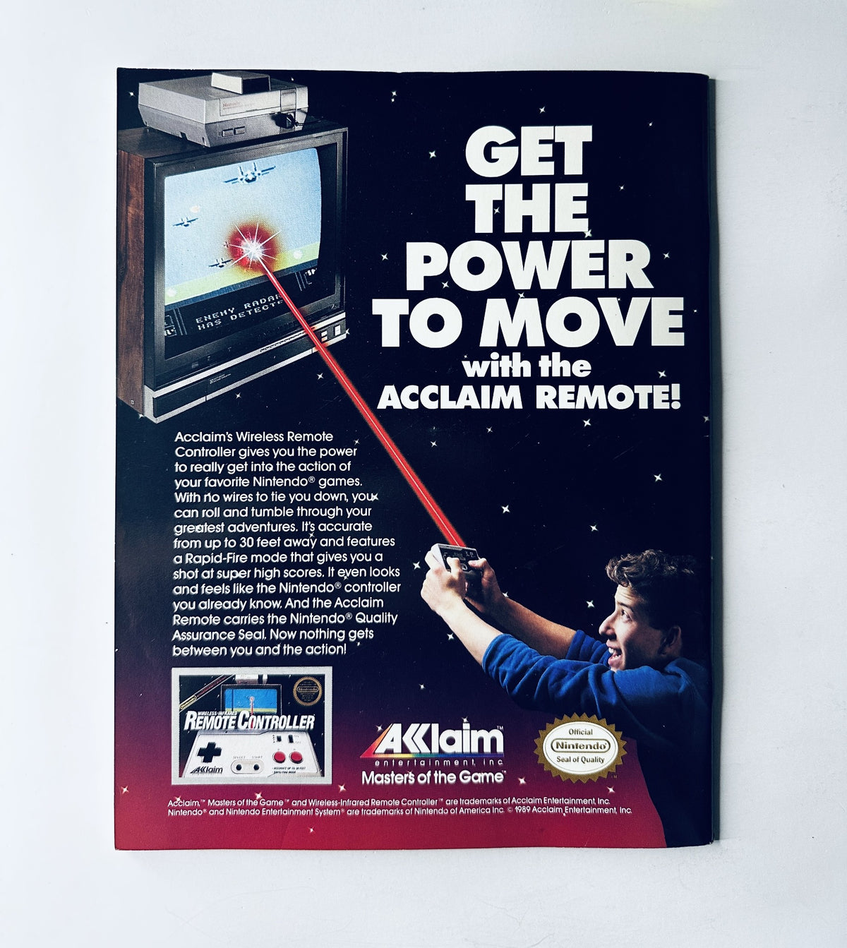 Advertisement from WWF Magazine May 1989 promoting the Acclaim Remote for Nintendo, showcasing its features for gamers and wrestling enthusiasts.