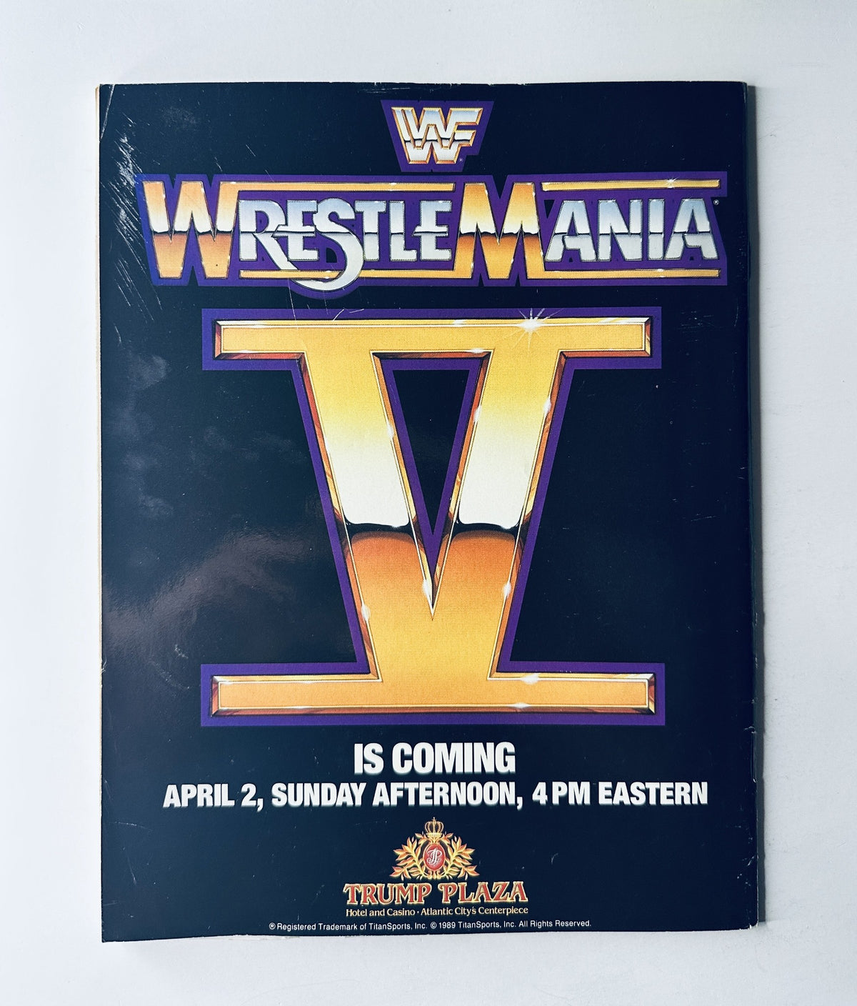 Promotional page for WrestleMania V in WWF Magazine March 1989, announcing the event date and location with bold graphics.