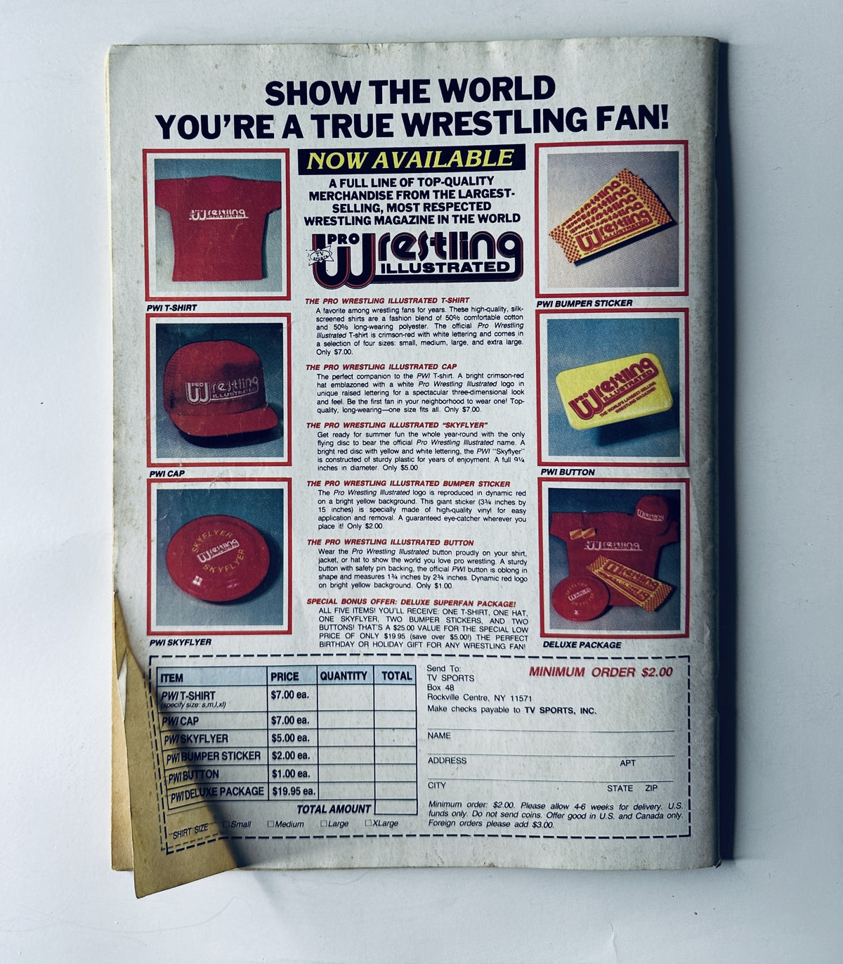 Promotional page from Pro Wrestling Illustrated Magazine June 1985 featuring merchandise for wrestling fans including caps, buttons, and pins, emphasizing the title 'SHOW THE WORLD YOU’RE A TRUE WRESTLING FAN!'. This page is part of a magazine issue that includes Dusty Rhodes and Hulk Hogan.