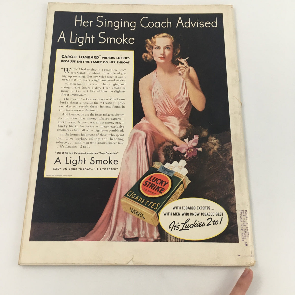 Cover of VTG Life Magazine from October 18, 1937 featuring a glamorous woman in a pink dress with flowers, promoting Lucky Strike cigarettes. The headline reads 'Her Singing Coach Advised A Light Smoke', highlighting vintage fashion and advertising from the 1930s.