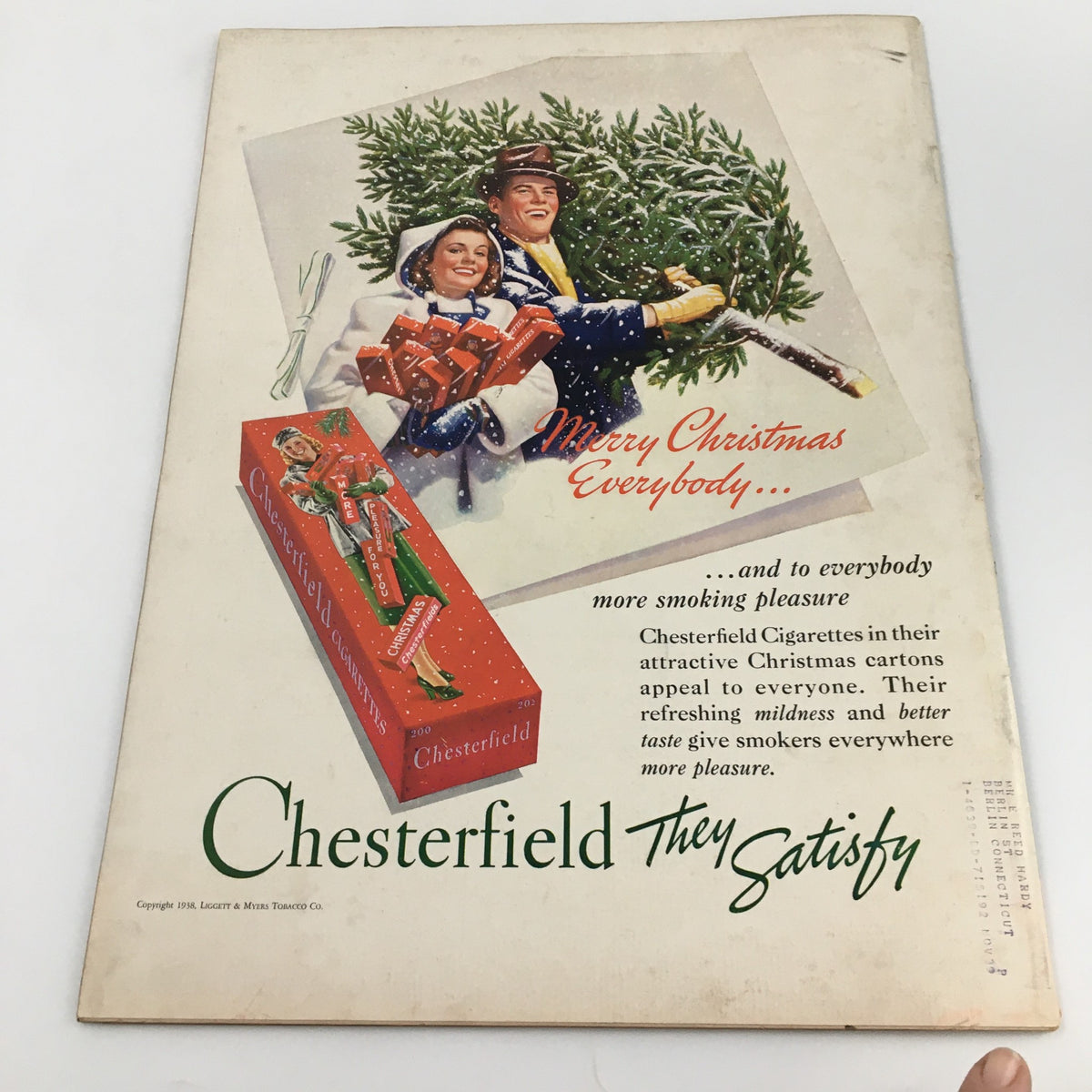 Back cover of Life Magazine December 26, 1938 showcasing a Chesterfield Cigarettes advertisement with a festive Christmas theme.