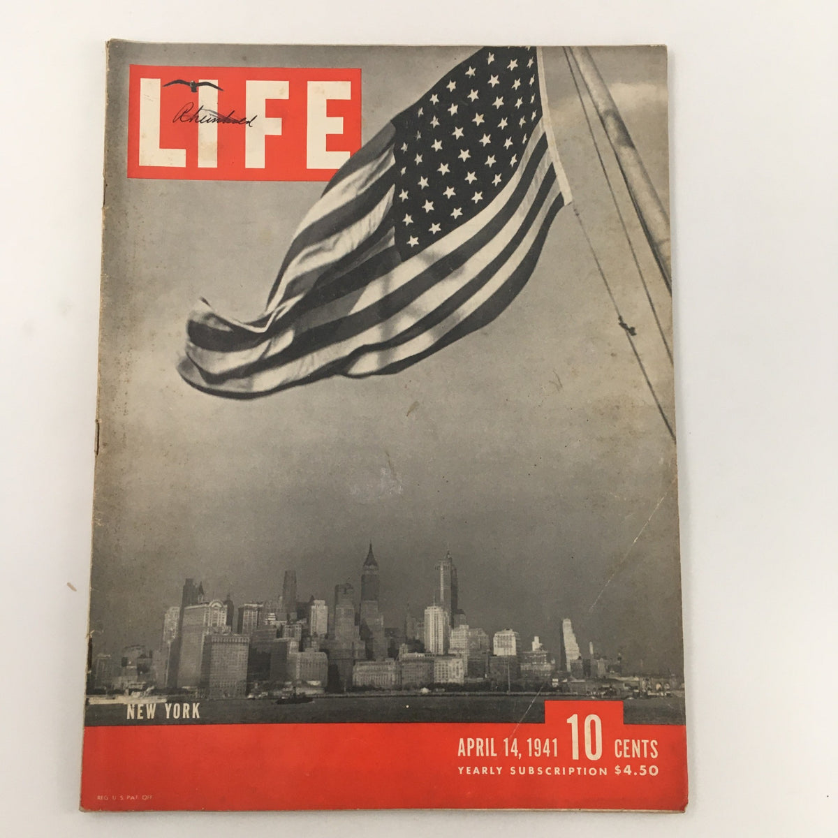 VTG Life Magazine April 14 1941 cover featuring New York City skyline with an American flag, showcasing vintage photography and culture.