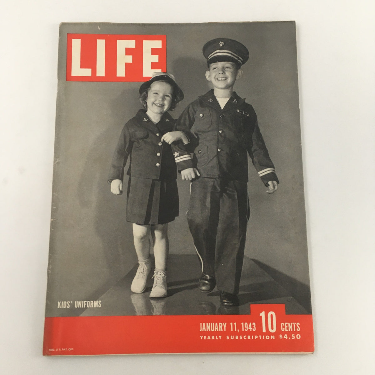 VTG Life Magazine January 11 1943 Kids' Uniform Cover featuring a girl and boy in military-style outfits, showcasing wartime fashion and nostalgia.