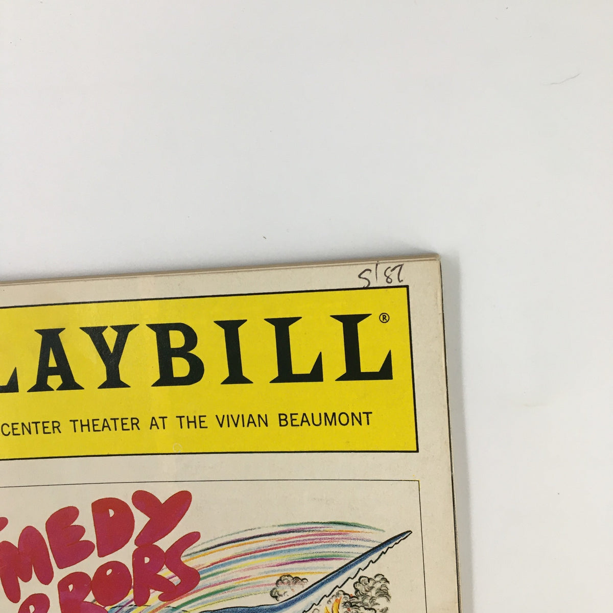 Close-up of the 1987 Playbill Lincoln Center Theater The Comedy of Errors highlighting the iconic title and details from the cover.