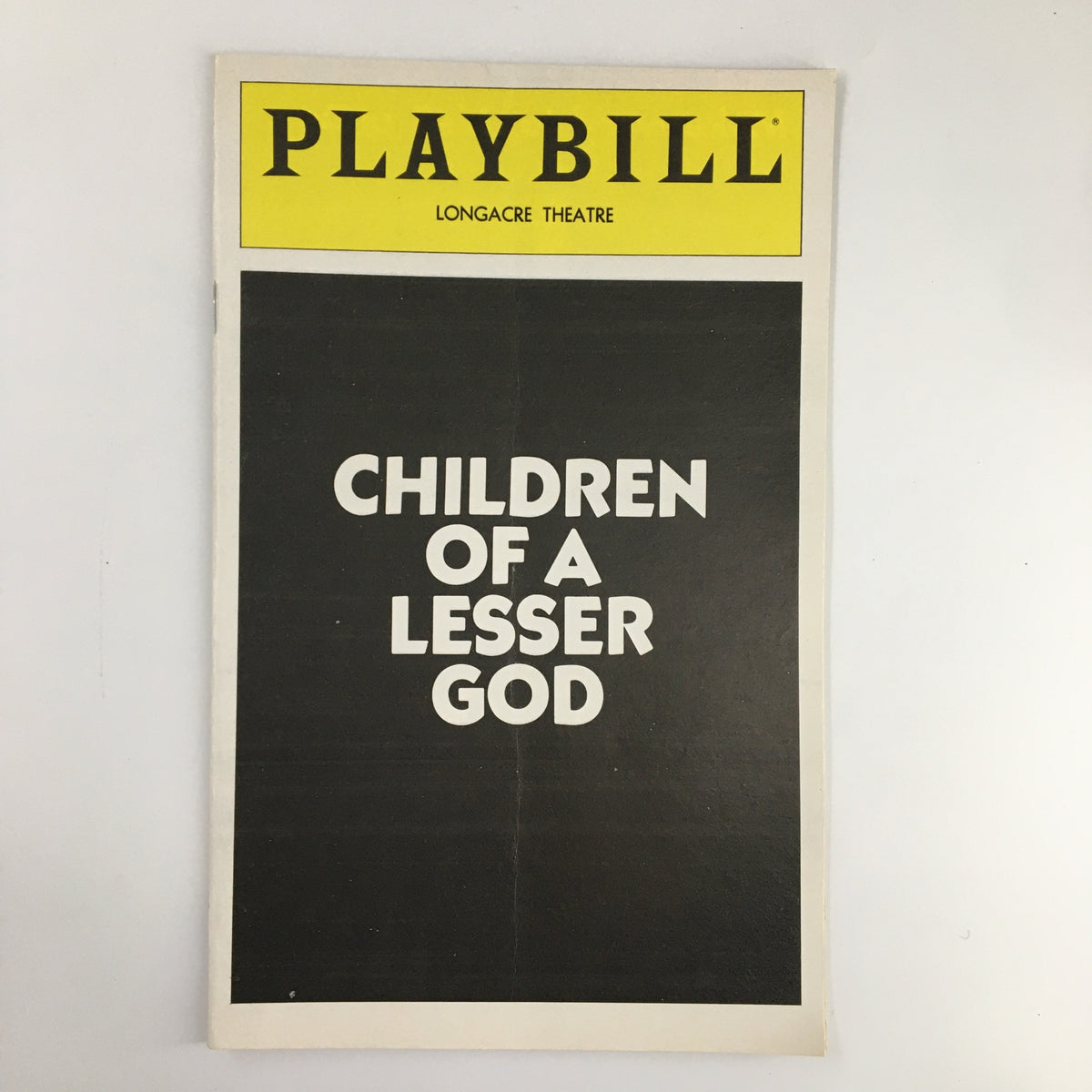 1980 Playbill for the Longacre Theatre production of Children of a Lesser God, showcasing the title prominently on the cover.