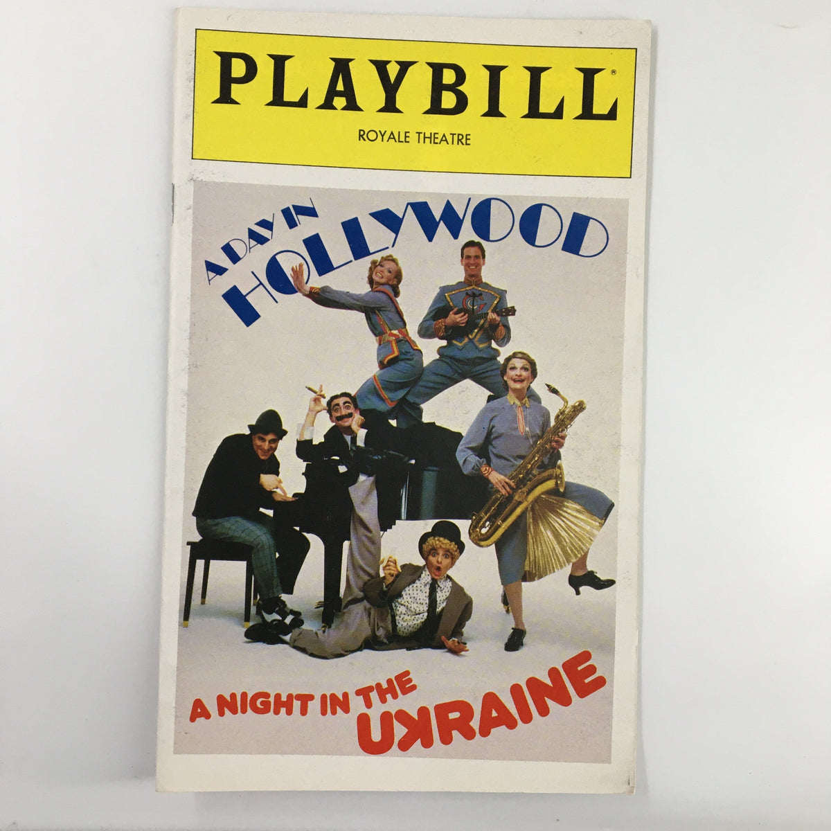 1980 Playbill from Royale Theatre featuring the production A Day In Hollywood A Night In The Ukraine, showcasing the cast in vibrant costumes on the cover.