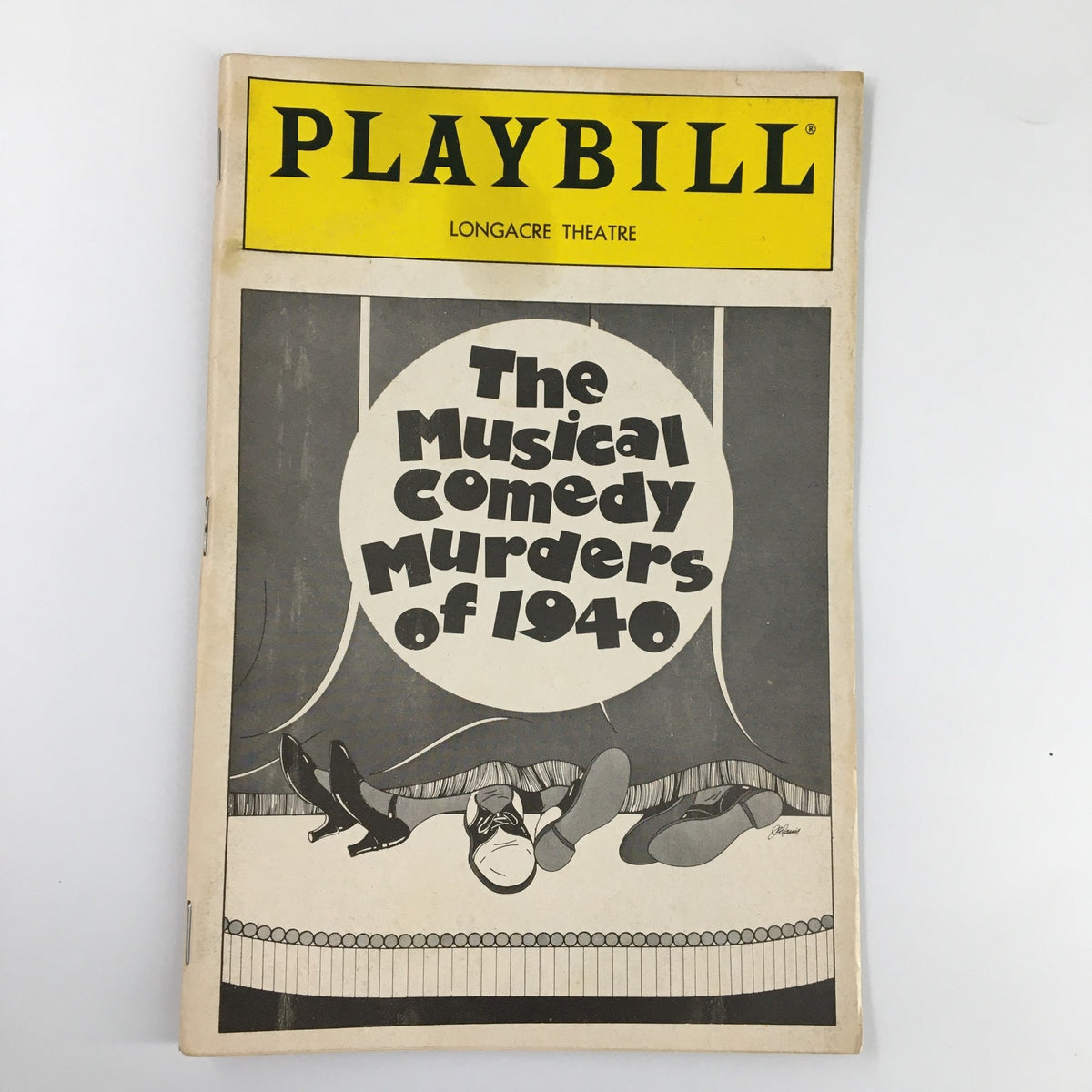 1987 Playbill for The Musical Comedy Murders of 1940, featuring black and white graphic design, displayed with theatrical elements.