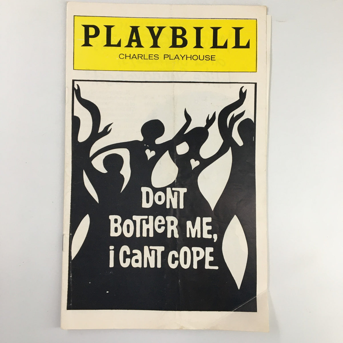 1976 Playbill for Don't Bother Me I Can't Cope at Charles Playhouse featuring artistic cover design.