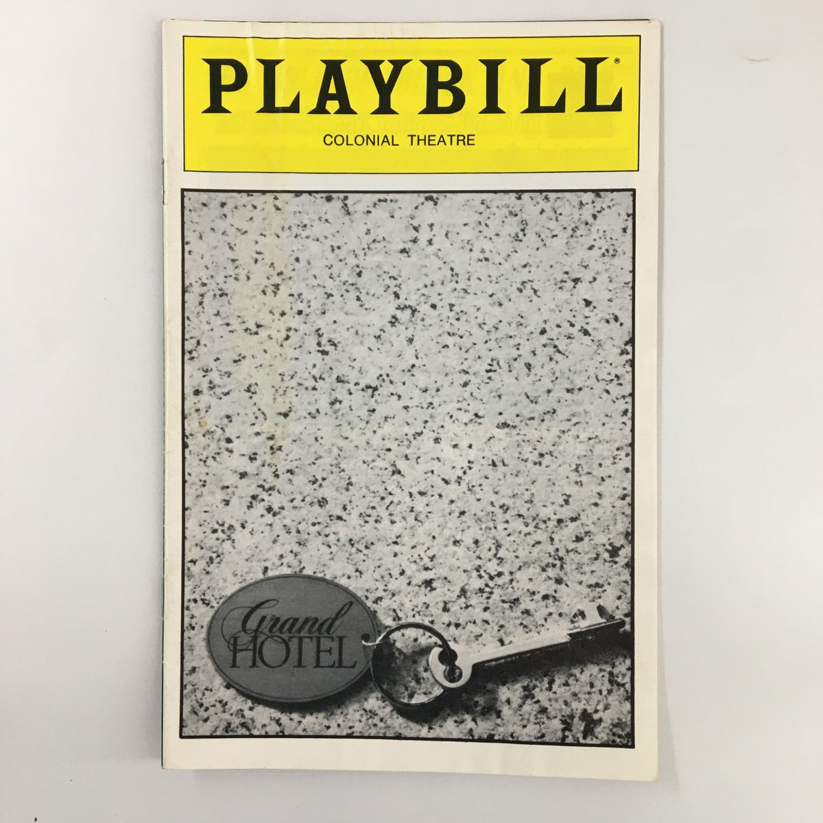 1989 Playbill for Grand Hotel at Colonial Theatre featuring a vintage key and ornate design.