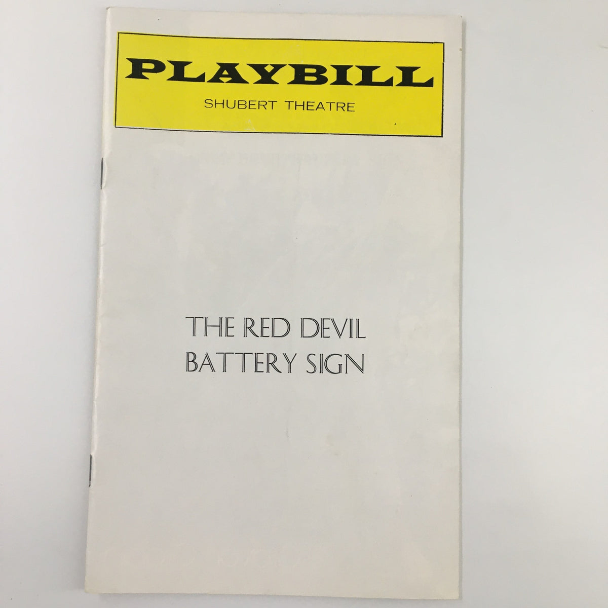 1975 Playbill for The Red Devil Battery Sign at Shubert Theatre, showcasing the iconic cover design.