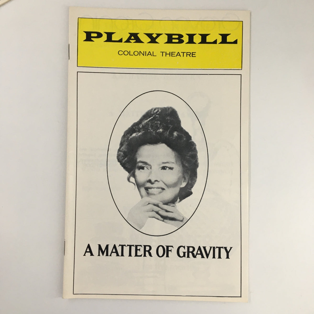 1975 Playbill The Colonial Theatre featuring Katharine Hepburn in A Matter of Gravity, showcasing the iconic front cover with a classic portrait of Hepburn.