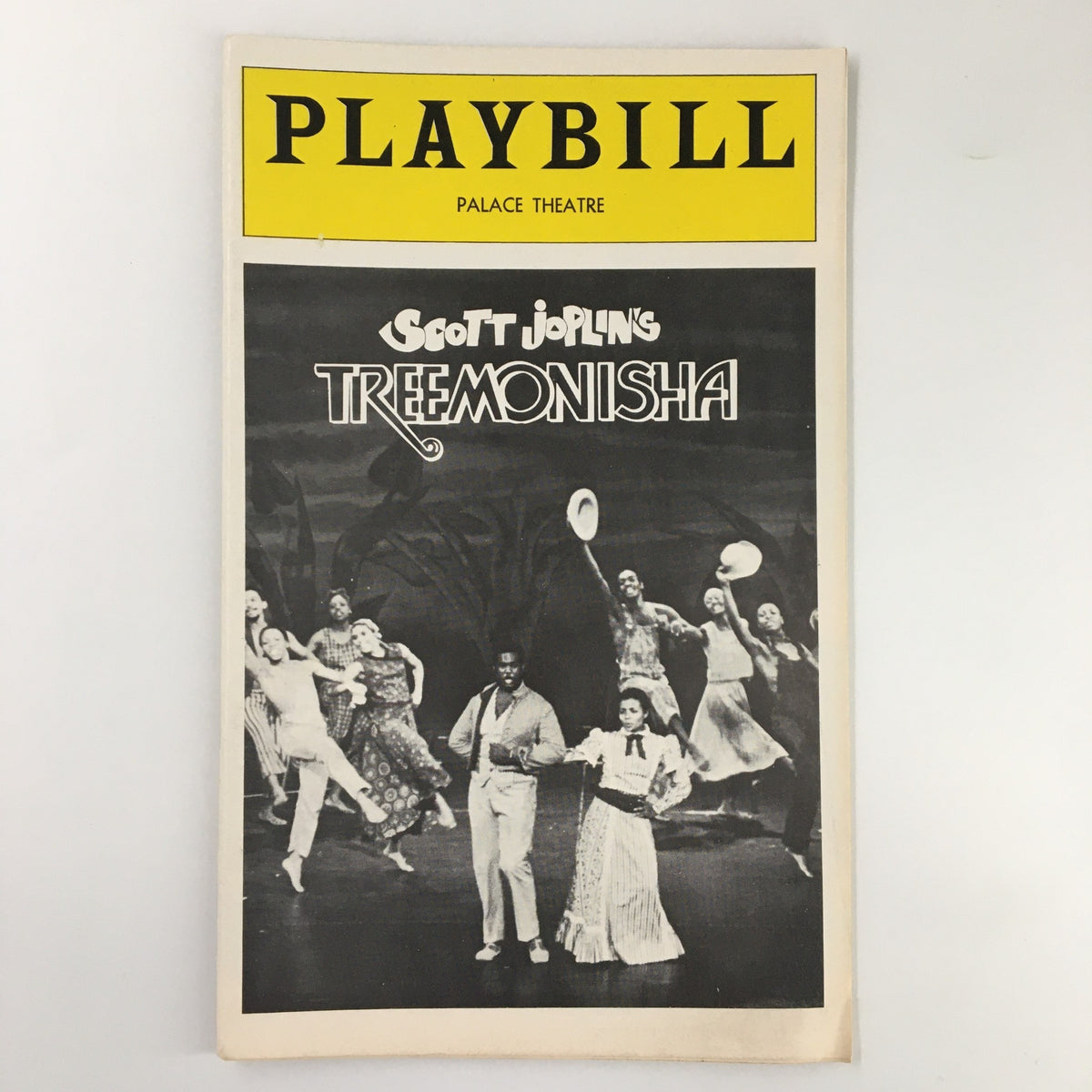 1975 Playbill from The Palace Theatre featuring Scott Joplin's Treemonisha, showcasing a captivating performance with a vintage design.