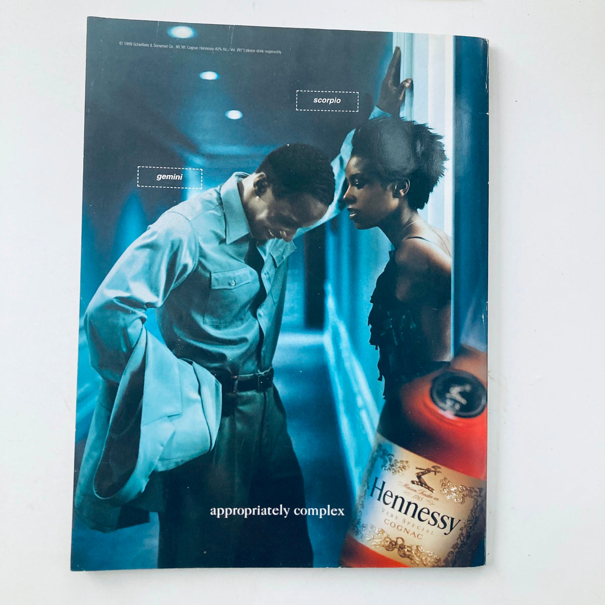 Playboy Magazine October 1999 Covergirl Jennifer Rovero. Vintage magazine cover featuring artistic photography with two models, emphasizing themes of astrology with labels for 'Scorpio' and 'Gemini', showcasing the essence of the late '90s fashion and design.