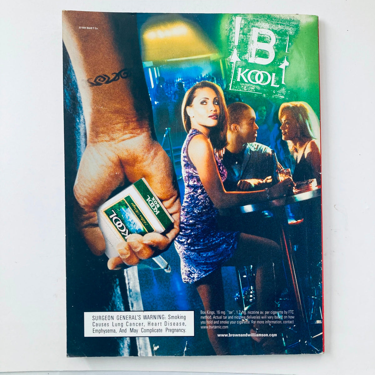 Back cover of Playboy Magazine November 1999 displaying an advertisement for Kool cigarettes with a vibrant nightclub scene.