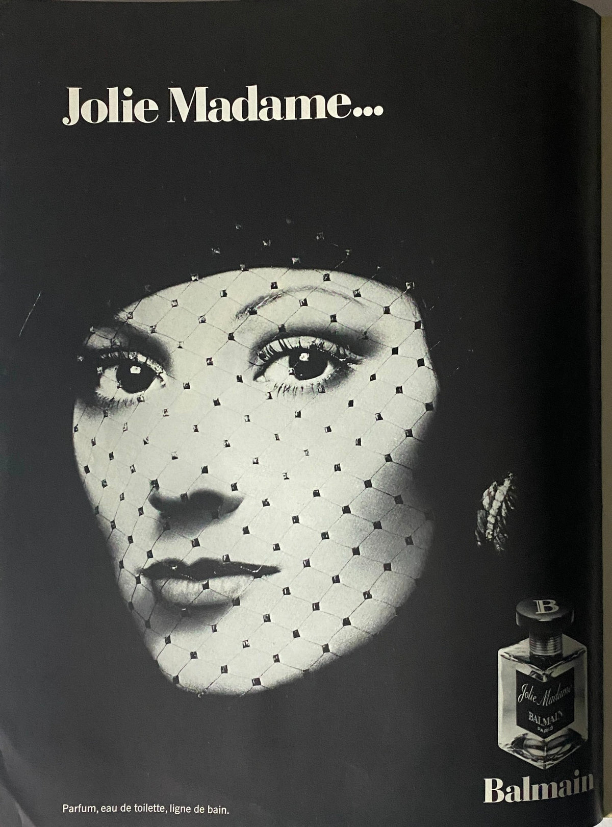 Vogue Paris Magazine May 1973 Jane Birkin Cover featuring a striking black and white advertisement for Balmain perfume with the text 'Jolie Madame...' highlighting vintage fashion advertising.