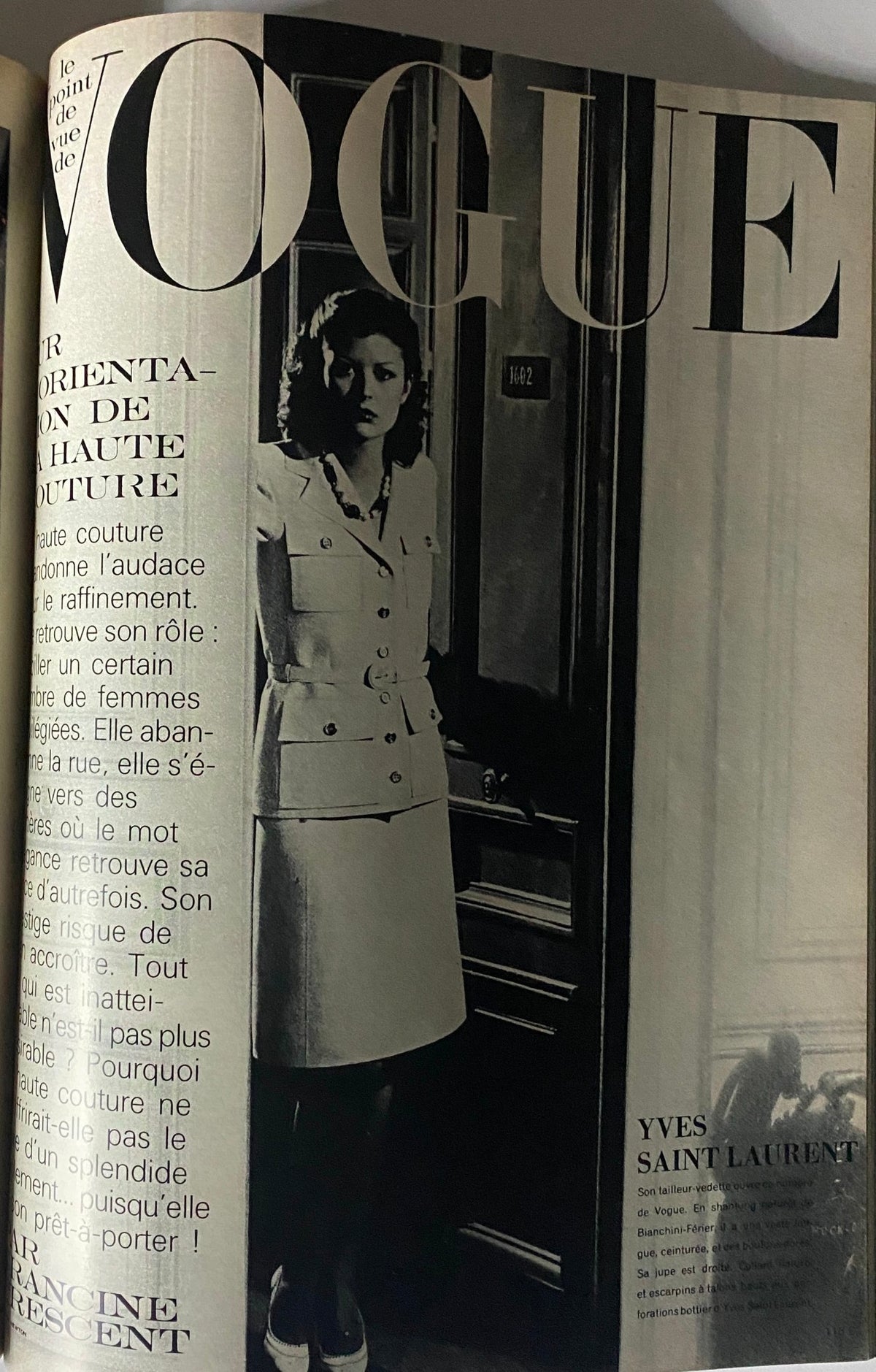 Interior page of Vogue Paris Magazine March 1972 featuring an editorial on haute couture, showcasing a dressed model and insights by Yves Saint Laurent.
