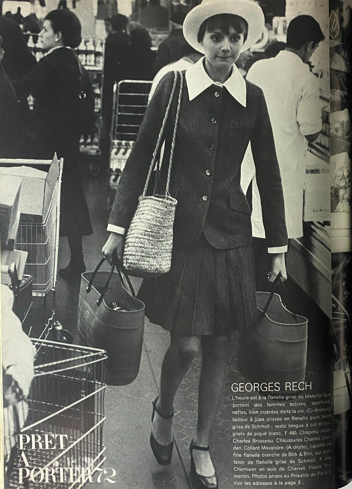Vogue Paris Magazine February 1972 Catherine Deneuve Cover featuring a model in a chic outfit, shopping bags in hand, reflecting 1970s fashion trends.