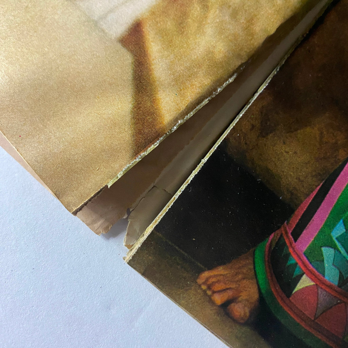 Close-up view of worn pages in Vogue Magazine December 1972, showing the magazine's vintage appeal.
