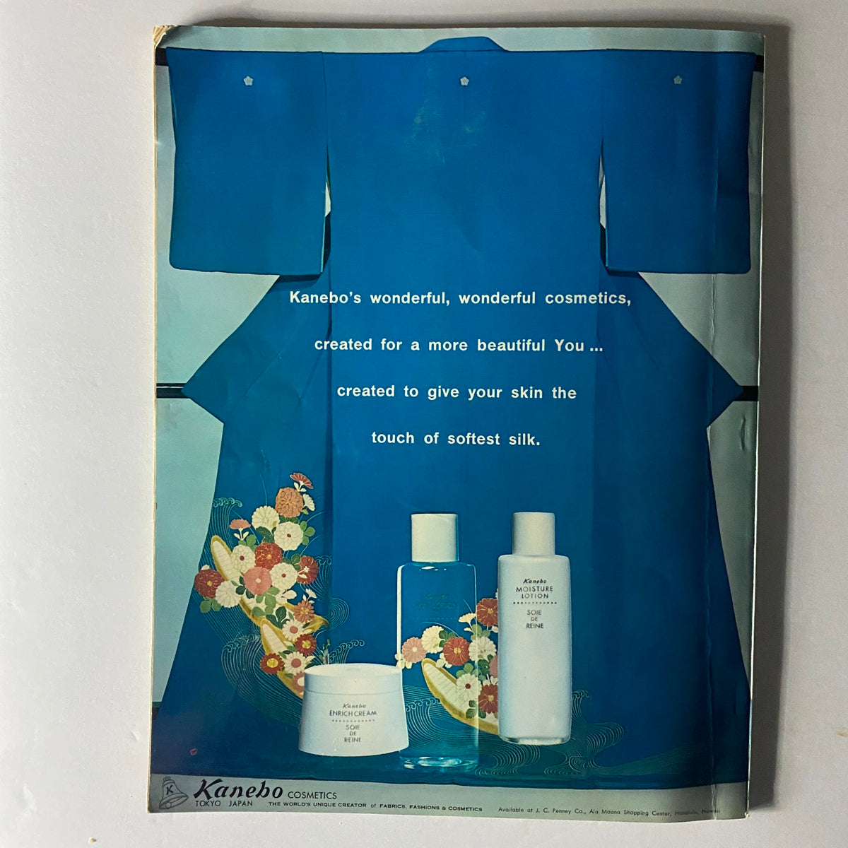 Vintage advertisement page from the Intern'l 1968 Edition Dressmaking Pattern Magazine featuring Kanebo cosmetics with elegant product design. The ad highlights the beauty of the cosmetics against a blue background. The title of the magazine is 'Intern'l 1968 Edition Dressmaking Pattern Magazine Mod No. 26 No Label'.