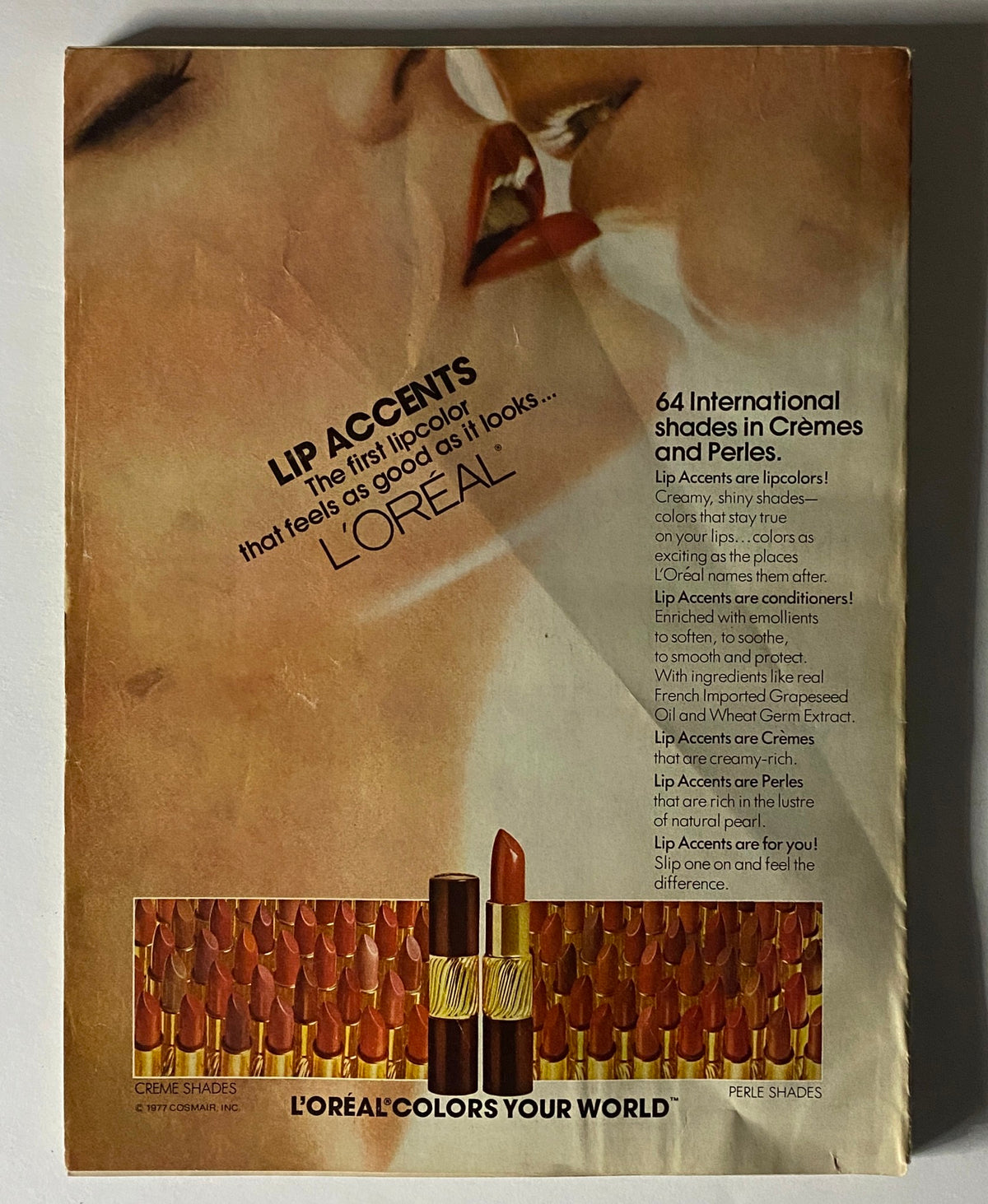 Vogue Magazine April 1977 L'Oreal advertisement for Lip Accents showcasing lipstick shades, reflecting the beauty trends of the 1970s.